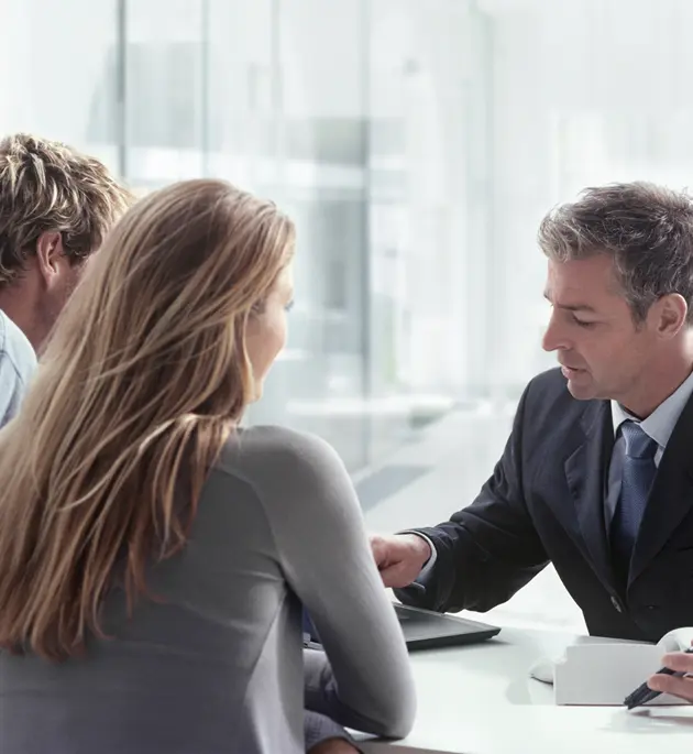 three business professional discussing about the project